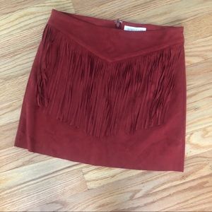 Suede skirt with fringes